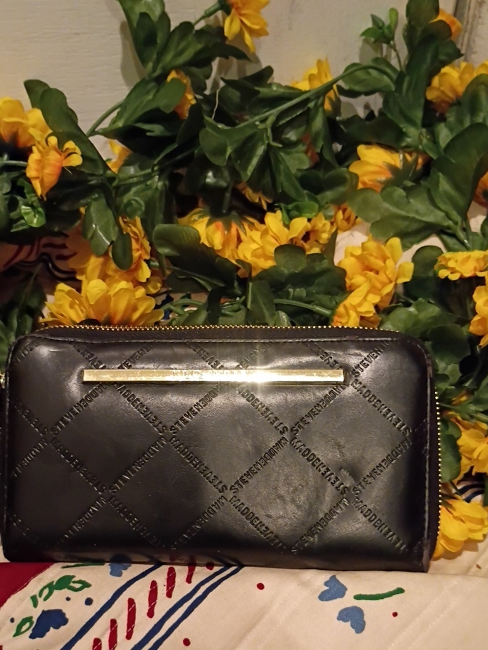 Black Quilted Zip-Around Wallet with Gold Accent